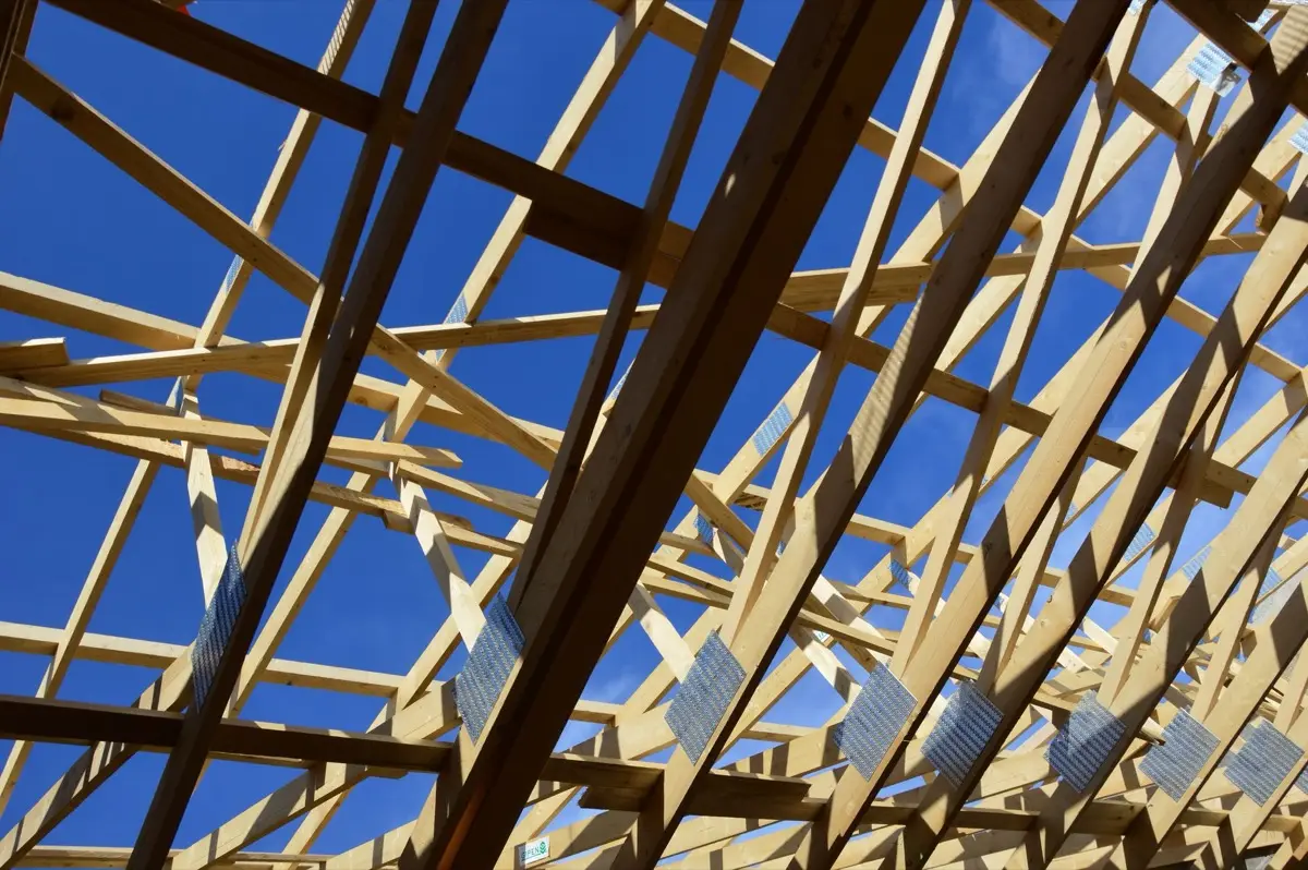 Bare rafters and panel decking on a house in Melbourne, FL before the covering goes back on